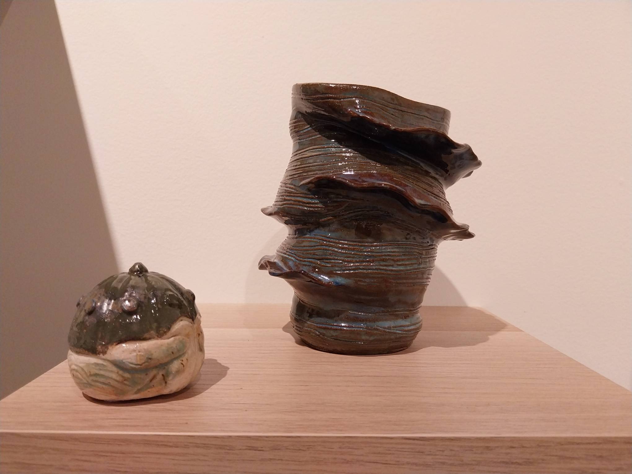 Two pottery works for "Crossing Boundaries."