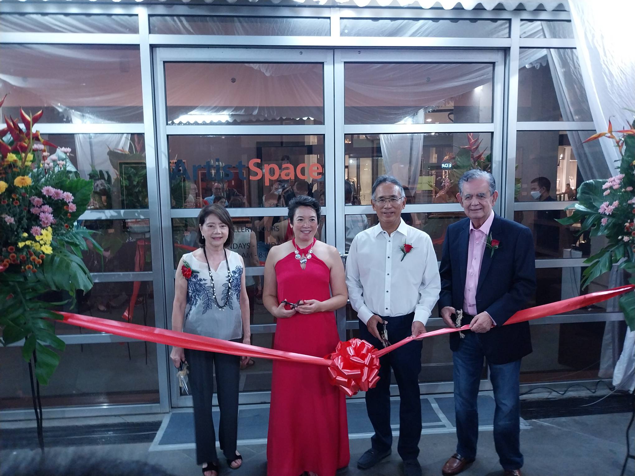 Mia Herbosa [center left] during the opening of "In The Spirit of Things..." at ArtistSpace Gallery.