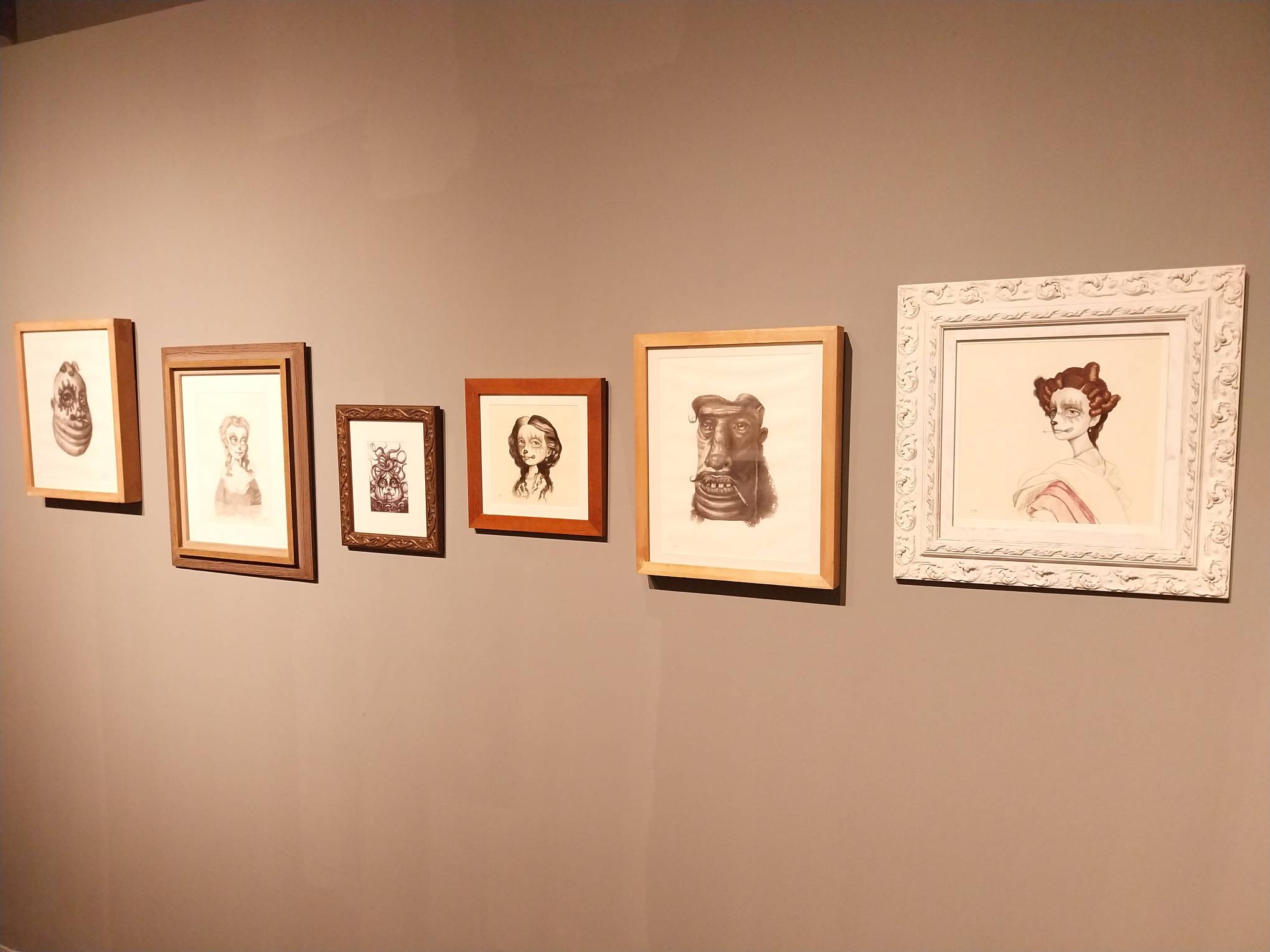 Baroque portraits by Luis Lorenzana displayed at Mono8 Gallery.