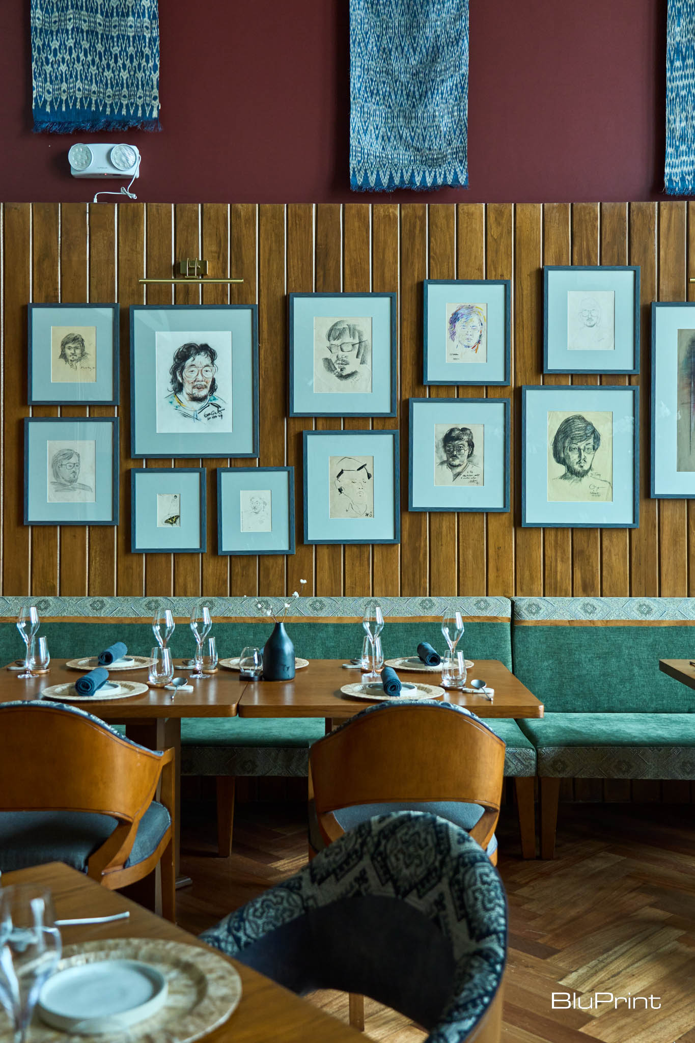 Sketches of Justin Nyuda portraits by his fellow artists.