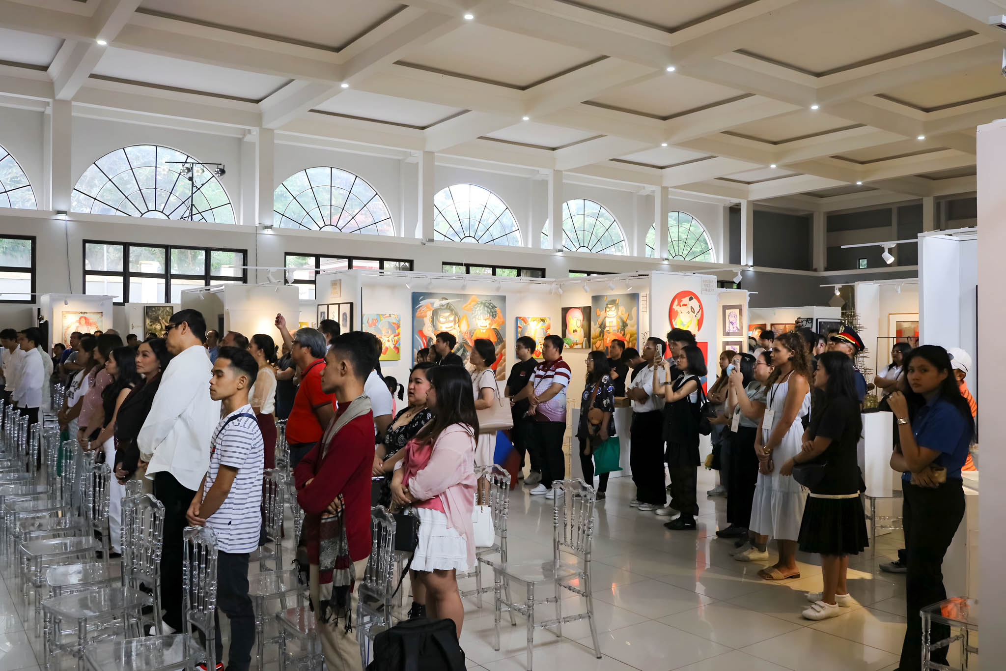 People near the stage for an event.