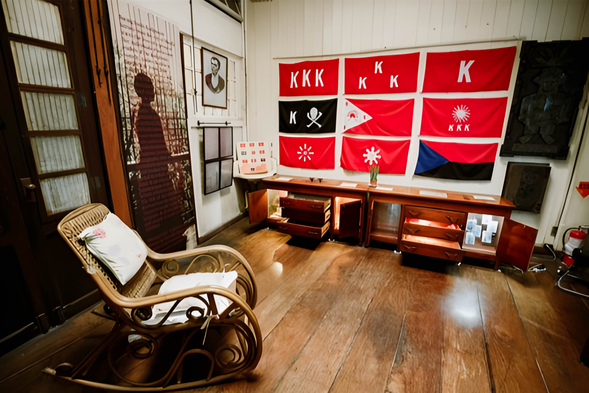 Flags of the Philippine Revolution displayed in a room at Bahay-Nakpil Bautista.