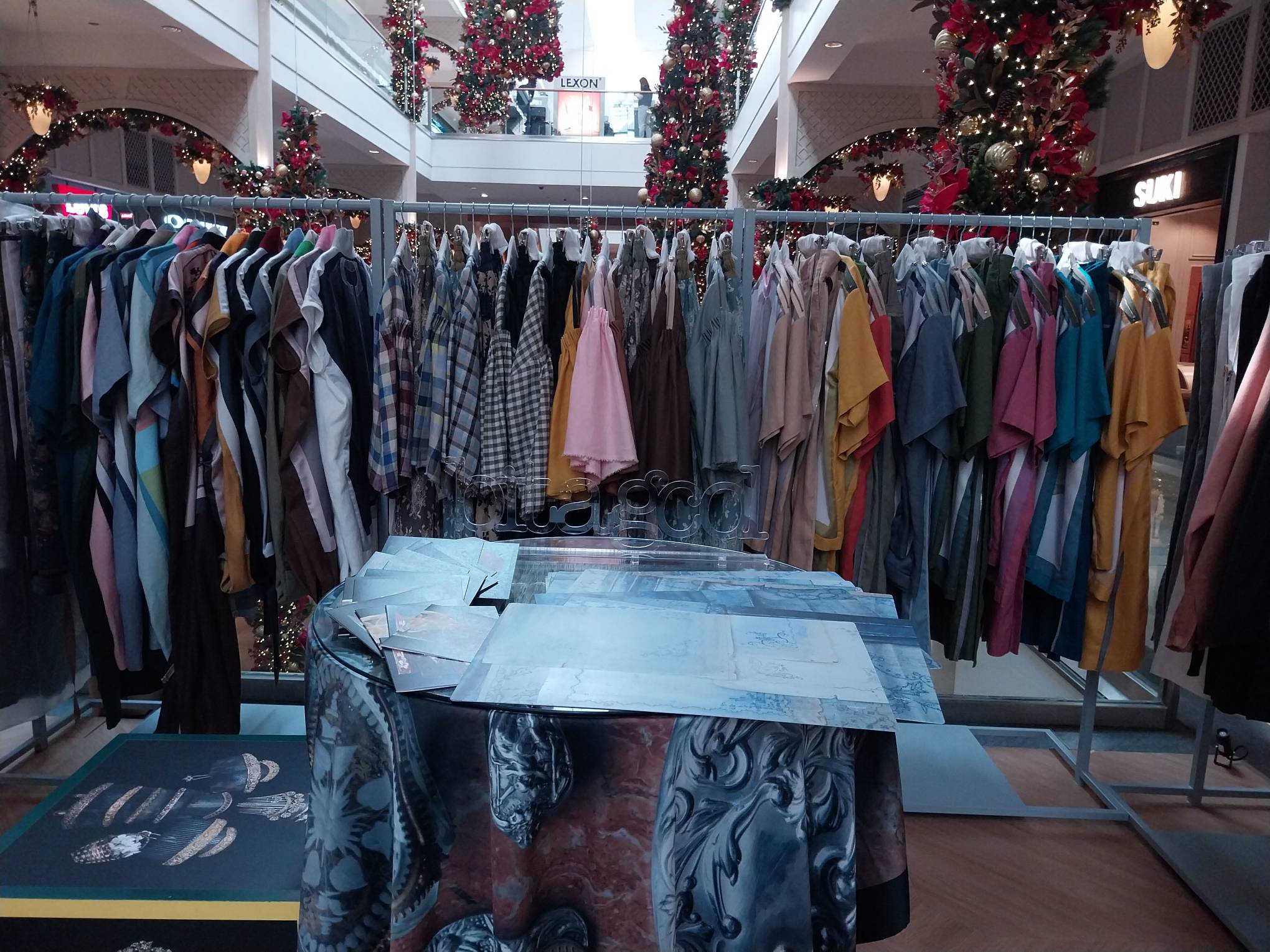 Racks of clothes at the Bitagcol pop-up store "re-start."