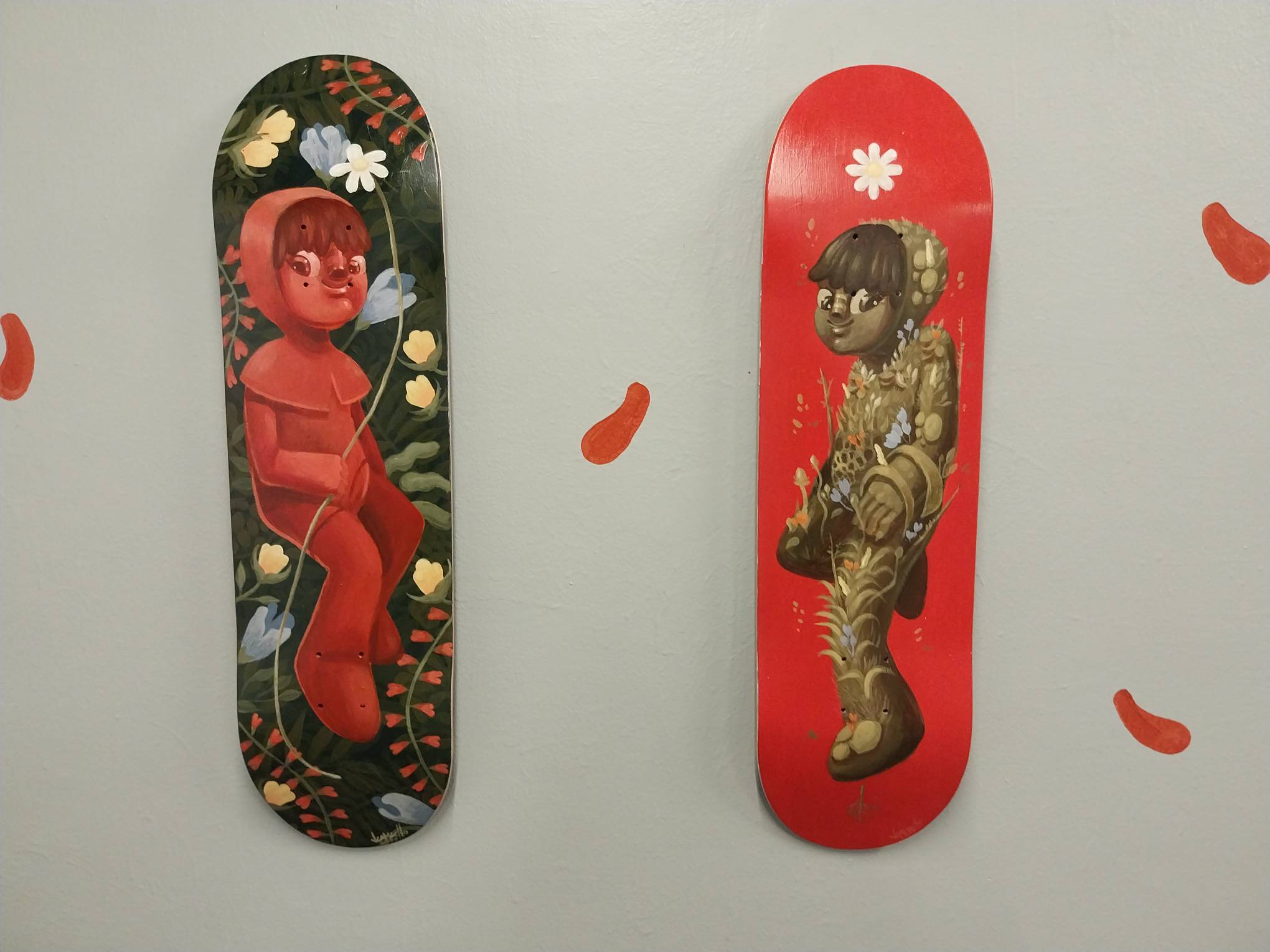 Skateboard decks by Jesse Camacho.