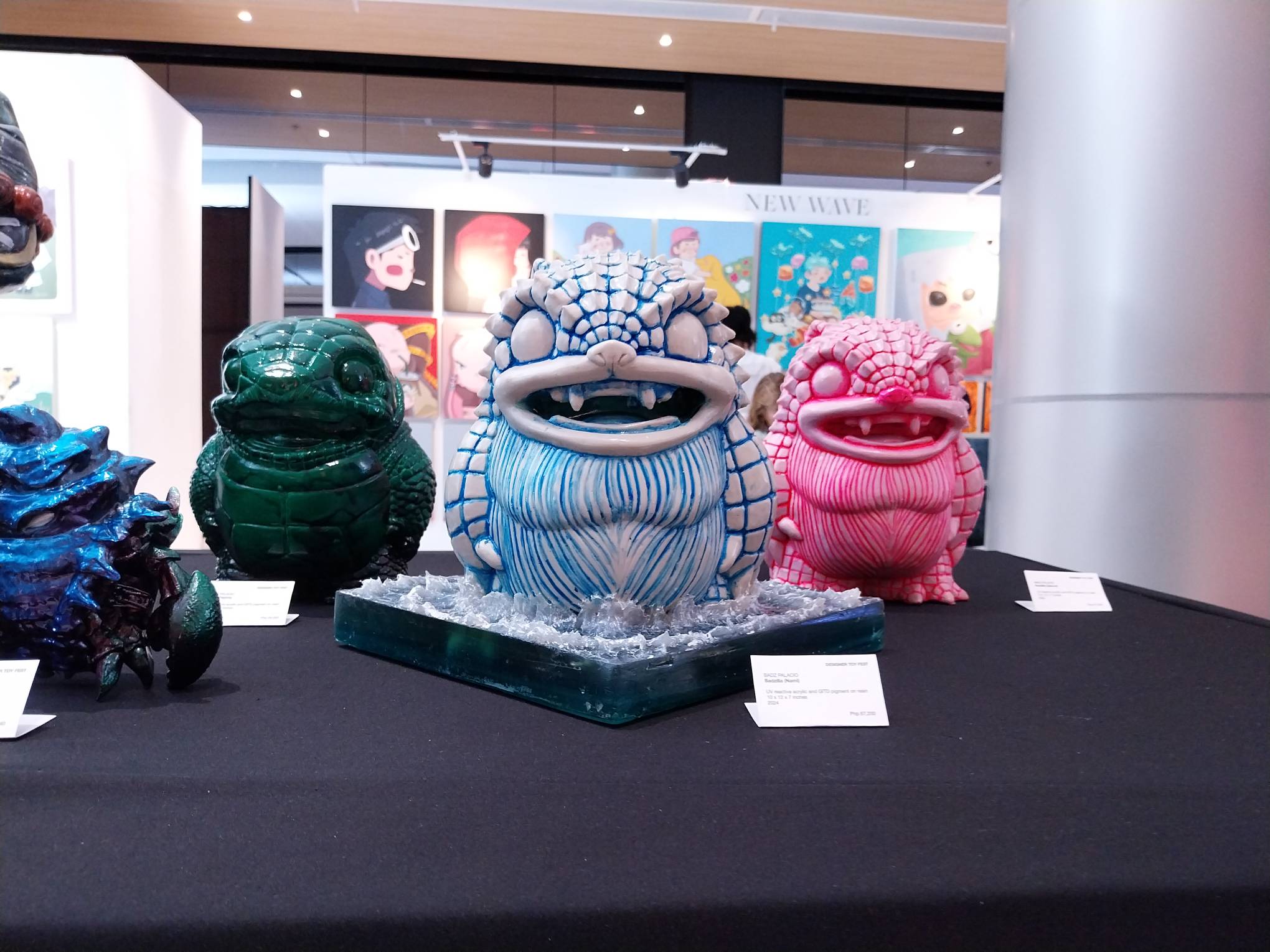 Godzilla-like toys shown at Bang! Designer Toys.