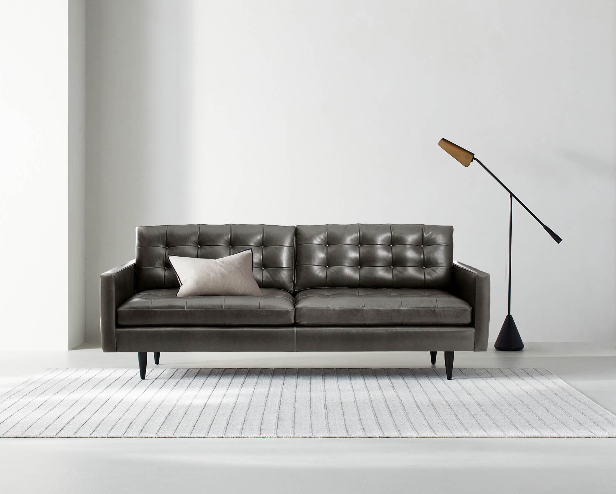 Petrie Leather Mid-Century Sofa.