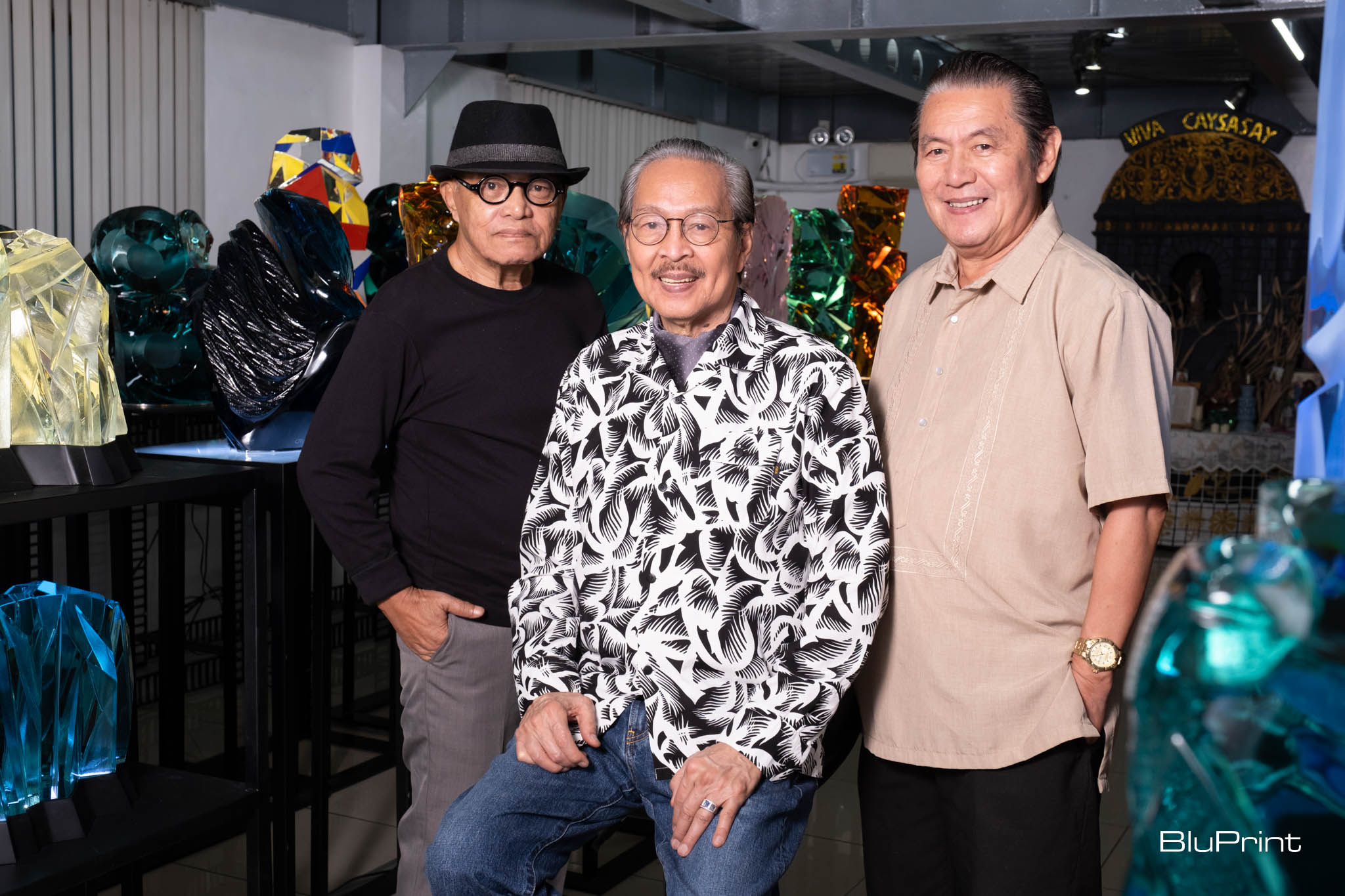 Ramon Orlina (center) with his collaborators for Visions in Glass, graphic artist Dopy Doplon (left) and author Cid Reyes (right).