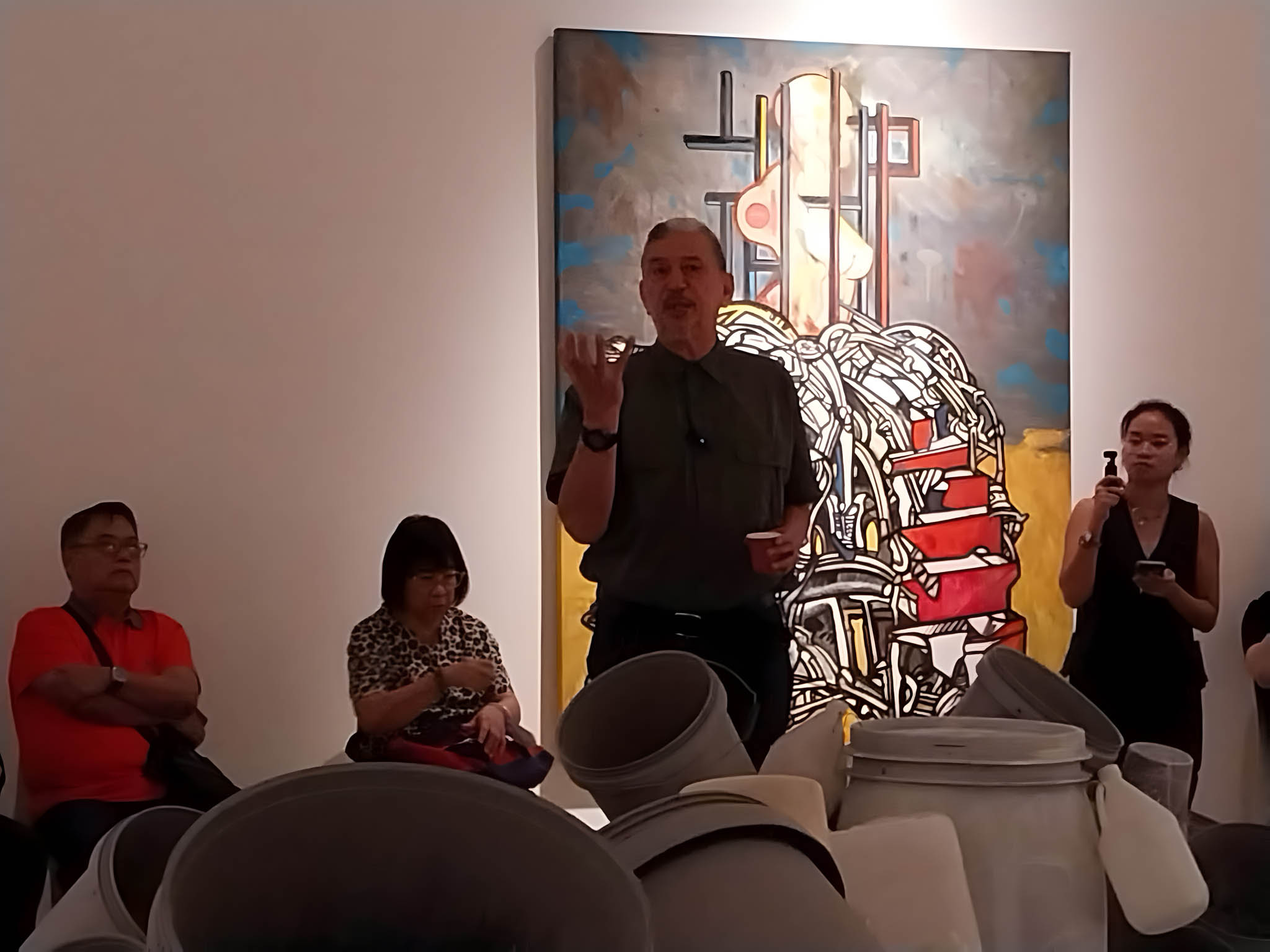 Jose Tence Ruiz during his exhibit walkthrough at Silverlens Manila.