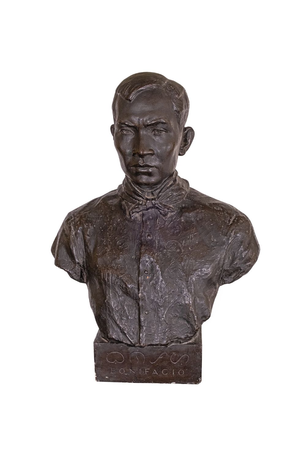 LOT 64, PROPERTY FROM THE PROFESSOR AMBETH R. OCAMPO COLLECTION, Guillermo Tolentino (1890 - 1976). Bust of Andres Bonifacio inscribed with Baybayin that reads "BO-NI-PA-[S]-YO" and with "Bonifacio" below it, both by Tolentino, renowed authority in Philippine script. Plaster of paris bust with bronze paint plaster casts. Kingly Treasures Auction.