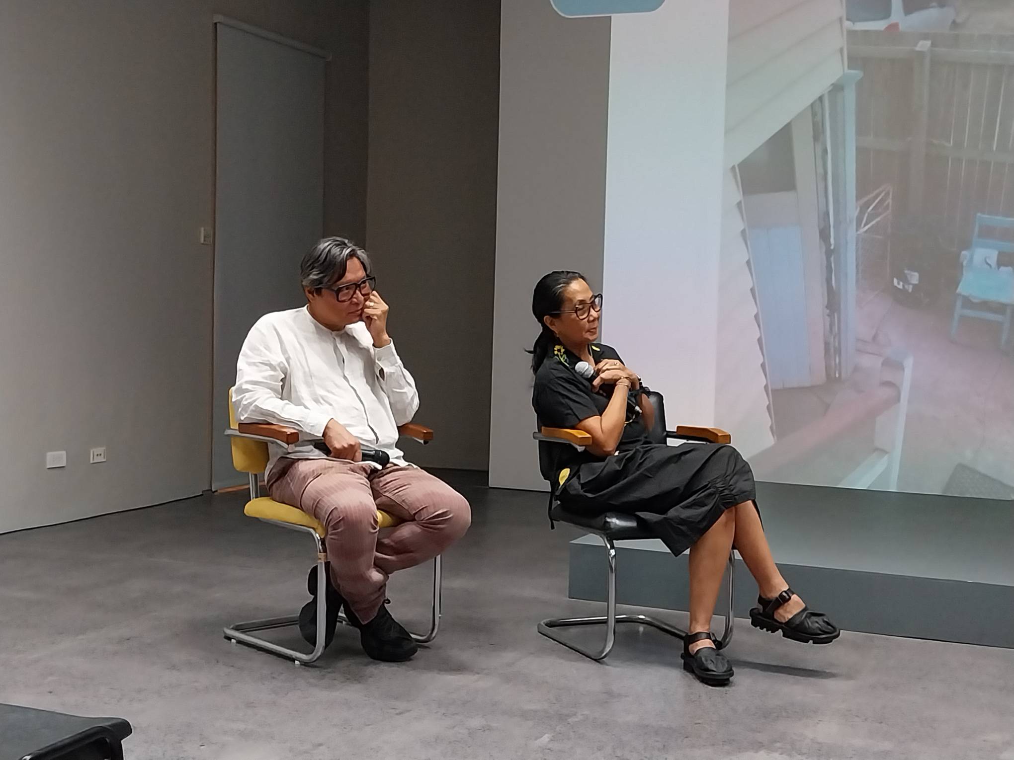 Isabel (right) and Alfredo Aquilizan during the "Project Belonging" opening.