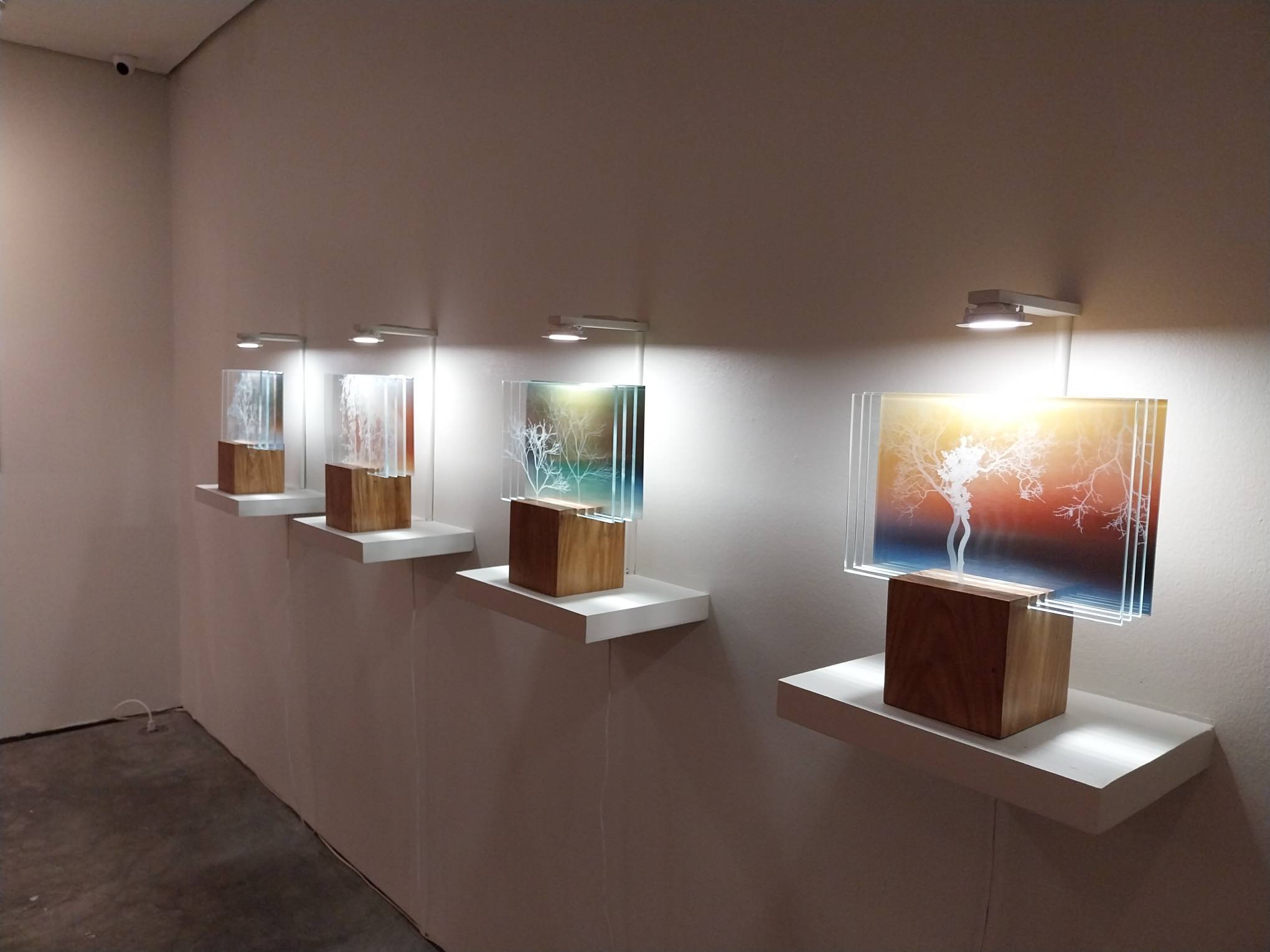 The four mounted glass works.