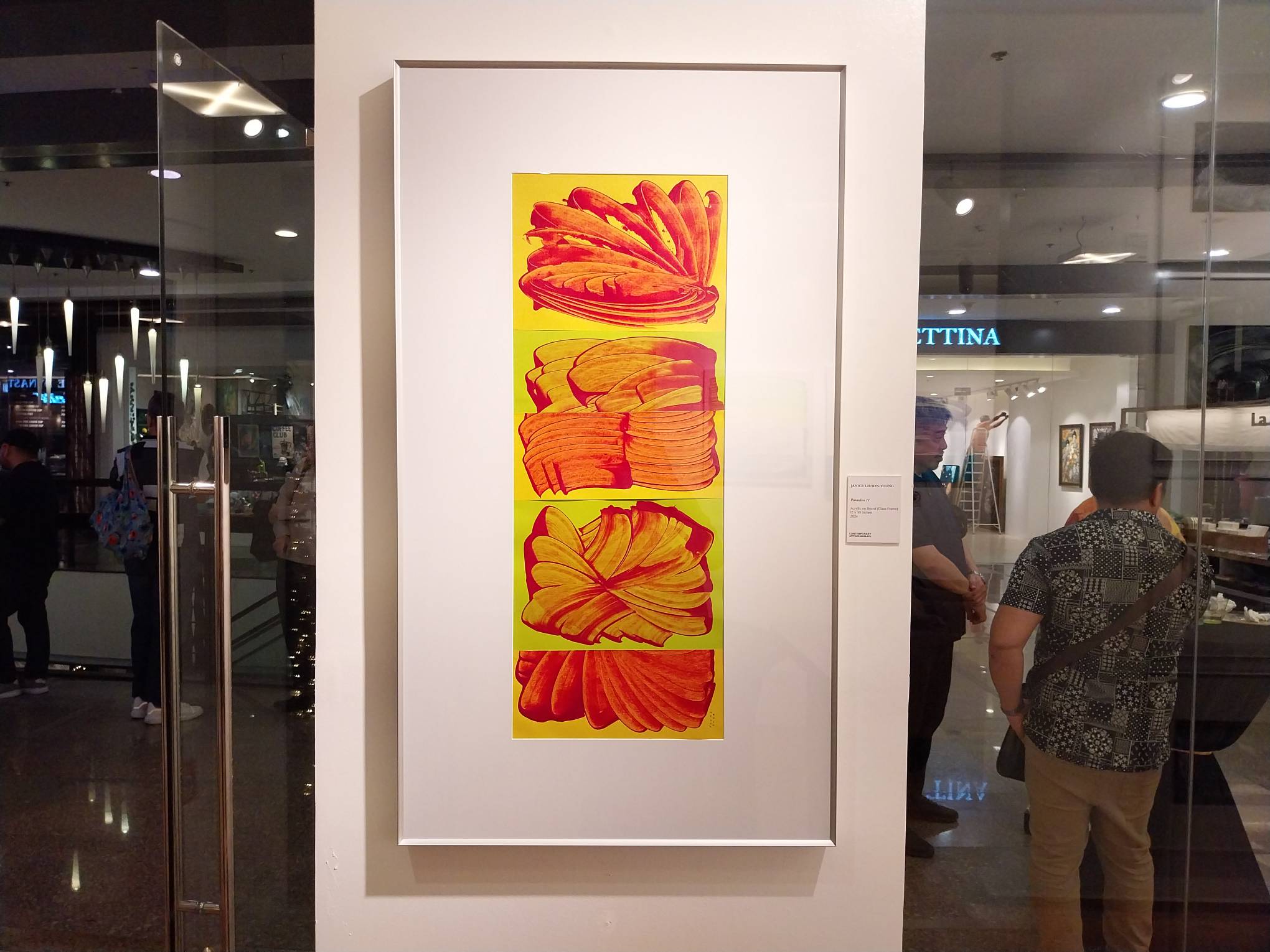 A red-and-yellow painting by Janice Liuson-Young.