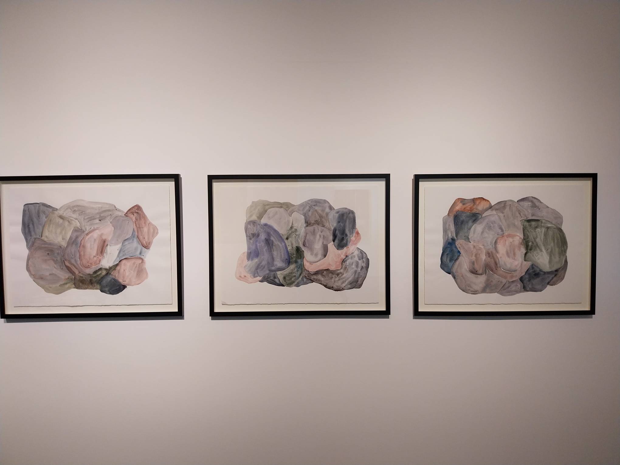 Three paintings by Carina Santos.