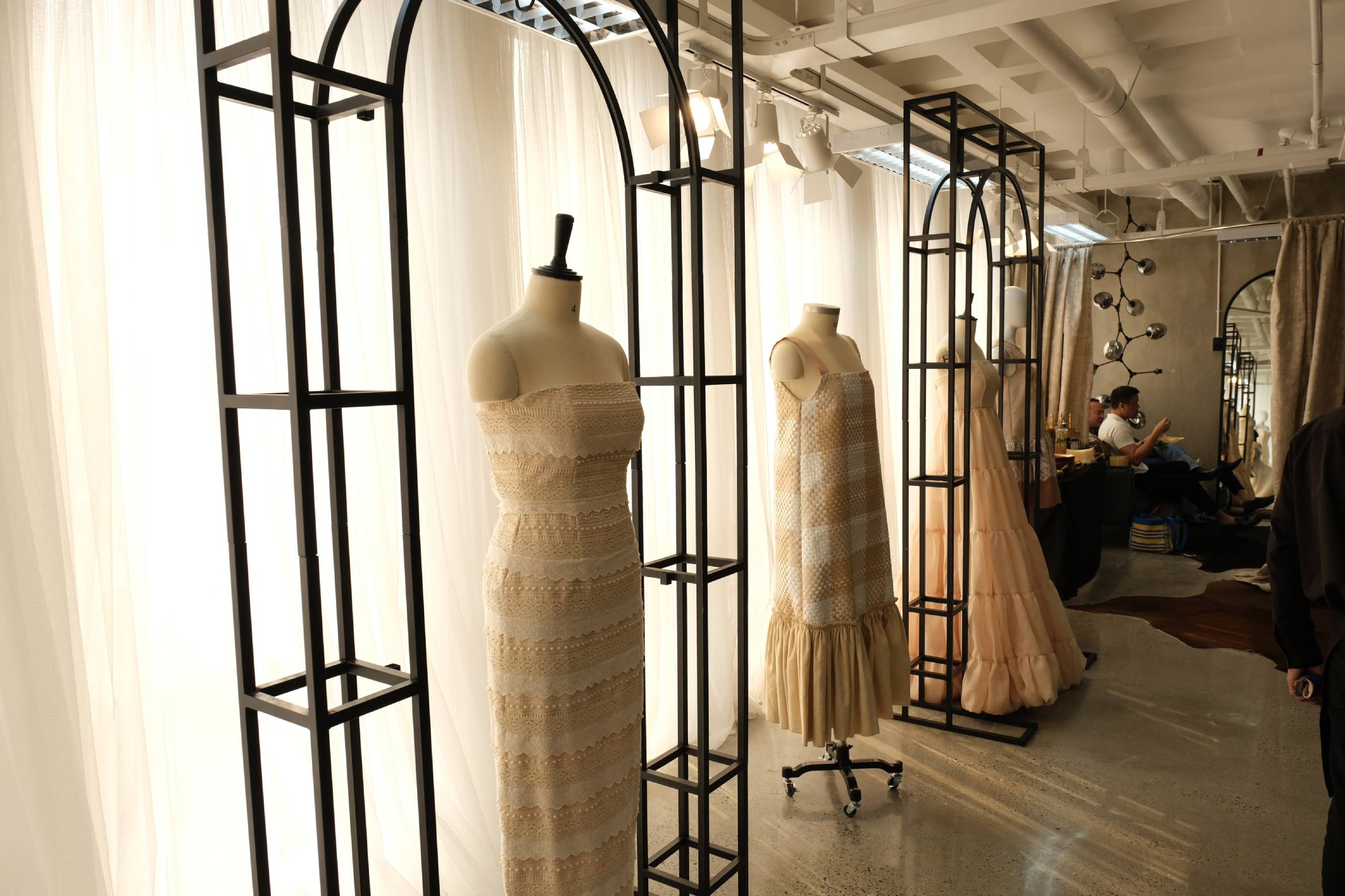 A row of bridal clothing.