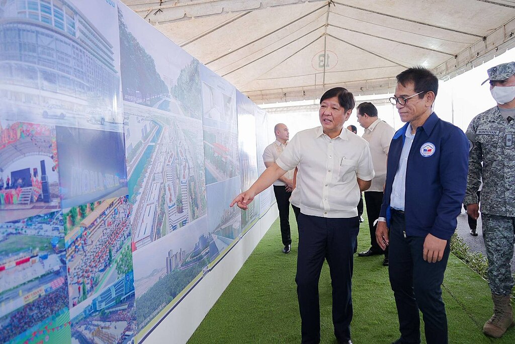 President Ferdinand Marcos, Jr. inspecting plans for a socialized housing project in Cebu. Photo by Presidential Communications Office. Source: Wikimedia Commons.