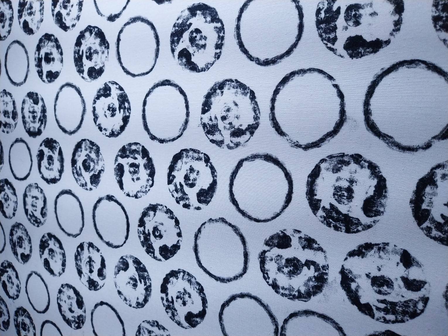 Close-up look at the circular detail of one of the works in "A Glimpse Across The Fleeting Light."