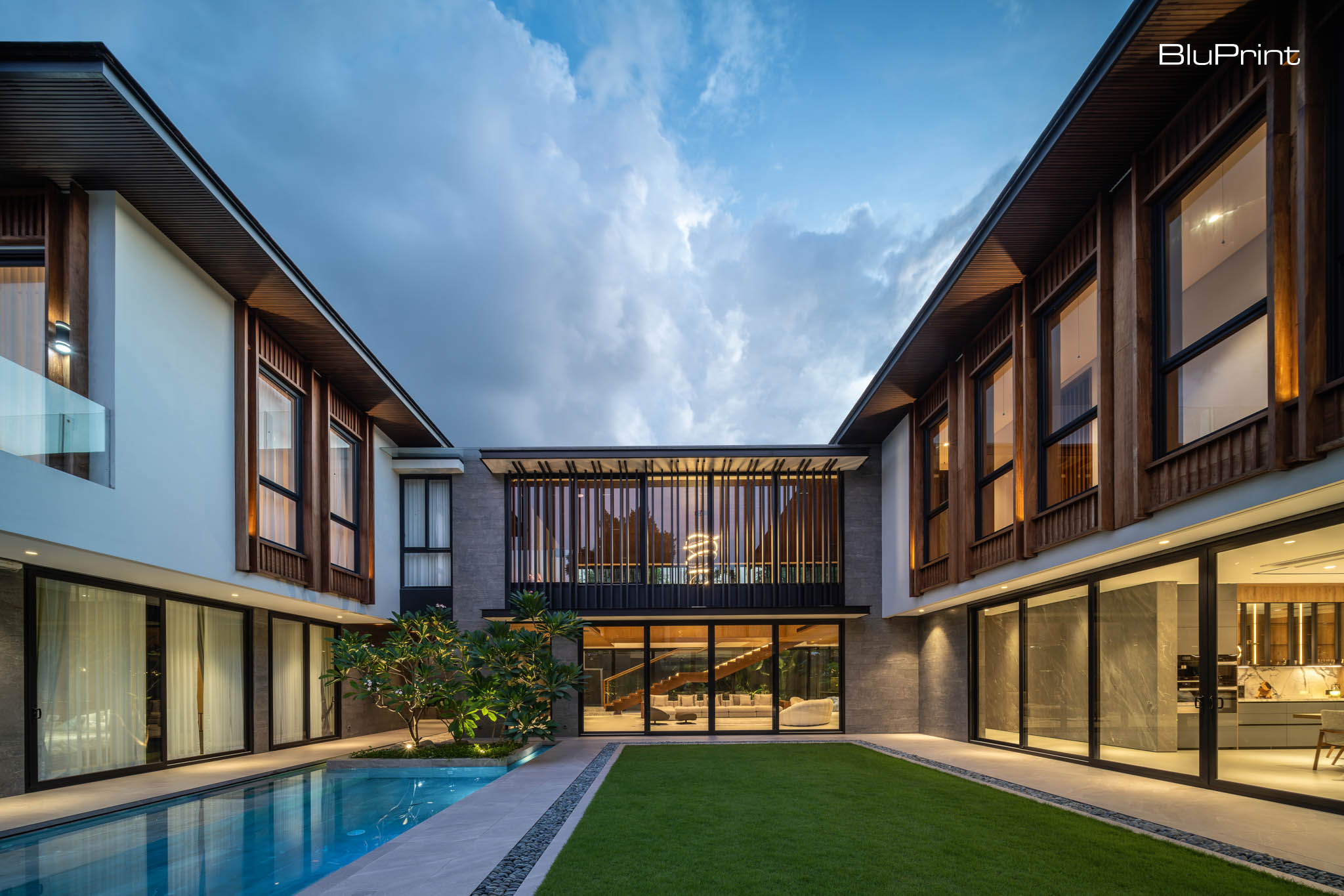 S Residence: Shelter in Place by Sim Ateliers. Sim Ateliers maximized the home's living areas by extending the structure to the property’s easement and anchoring the design around the central courtyard.