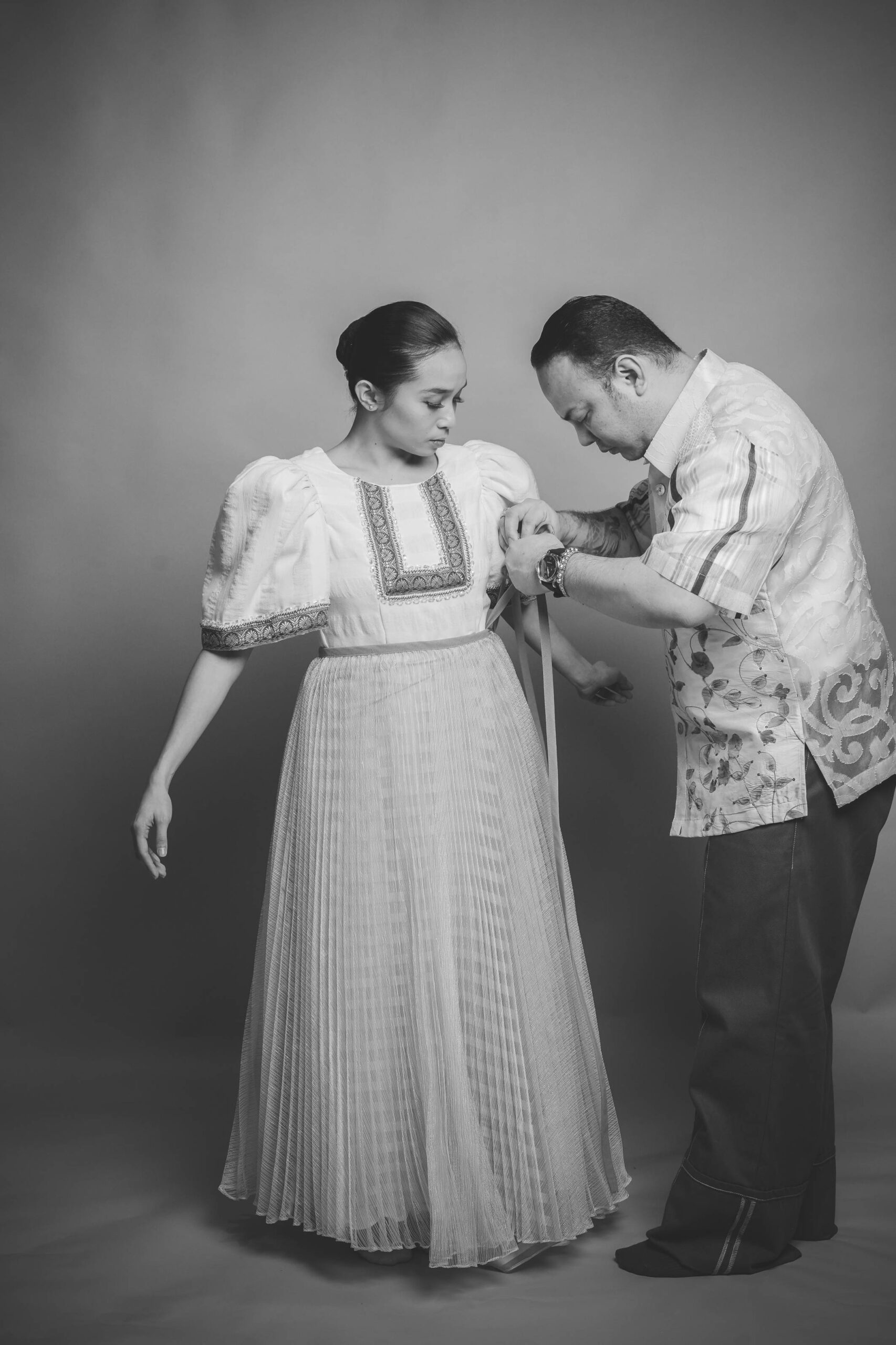 Jor-El Espina working on one of the costumes for "Ang Panaginip."