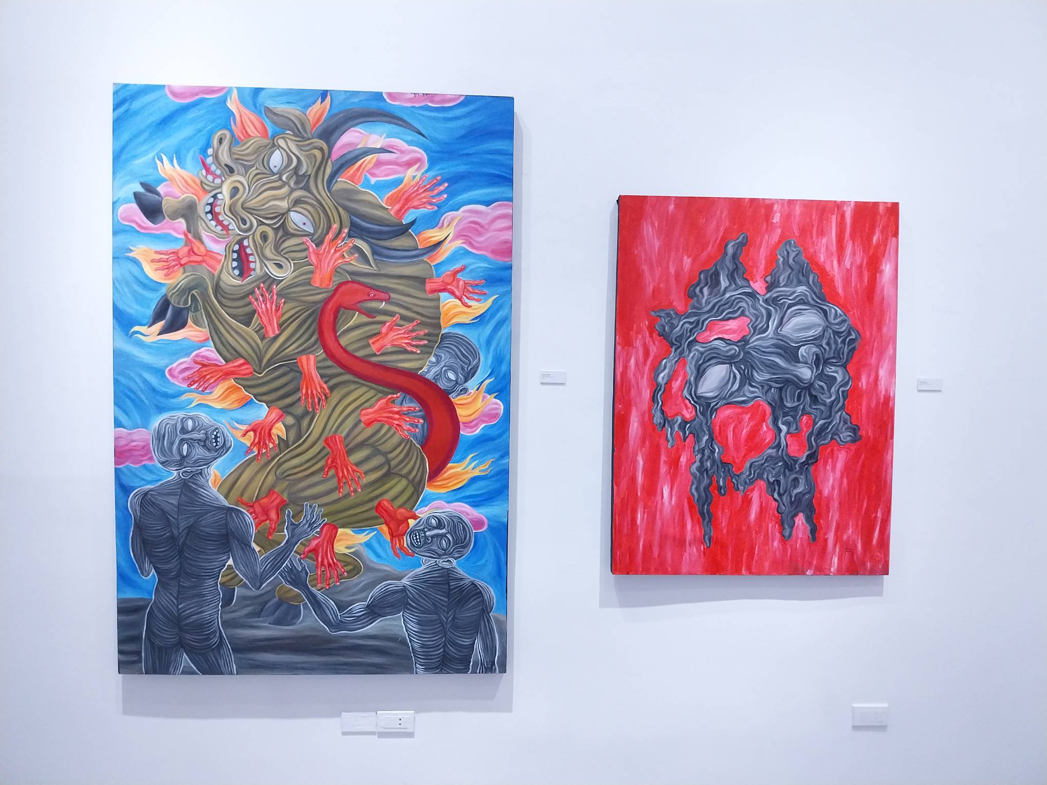 Two works shown at "Creatures of Apathy" at Altro Mondo Creative Space.