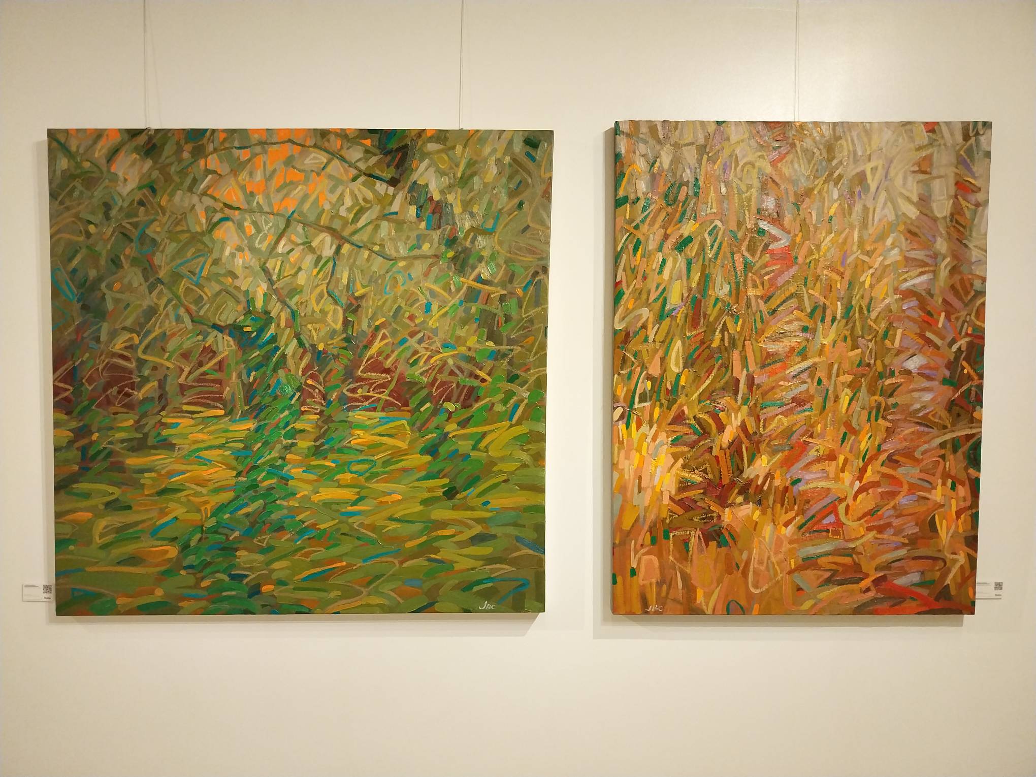 Two paintings by Janine Barrera at "Beyond the Bark."