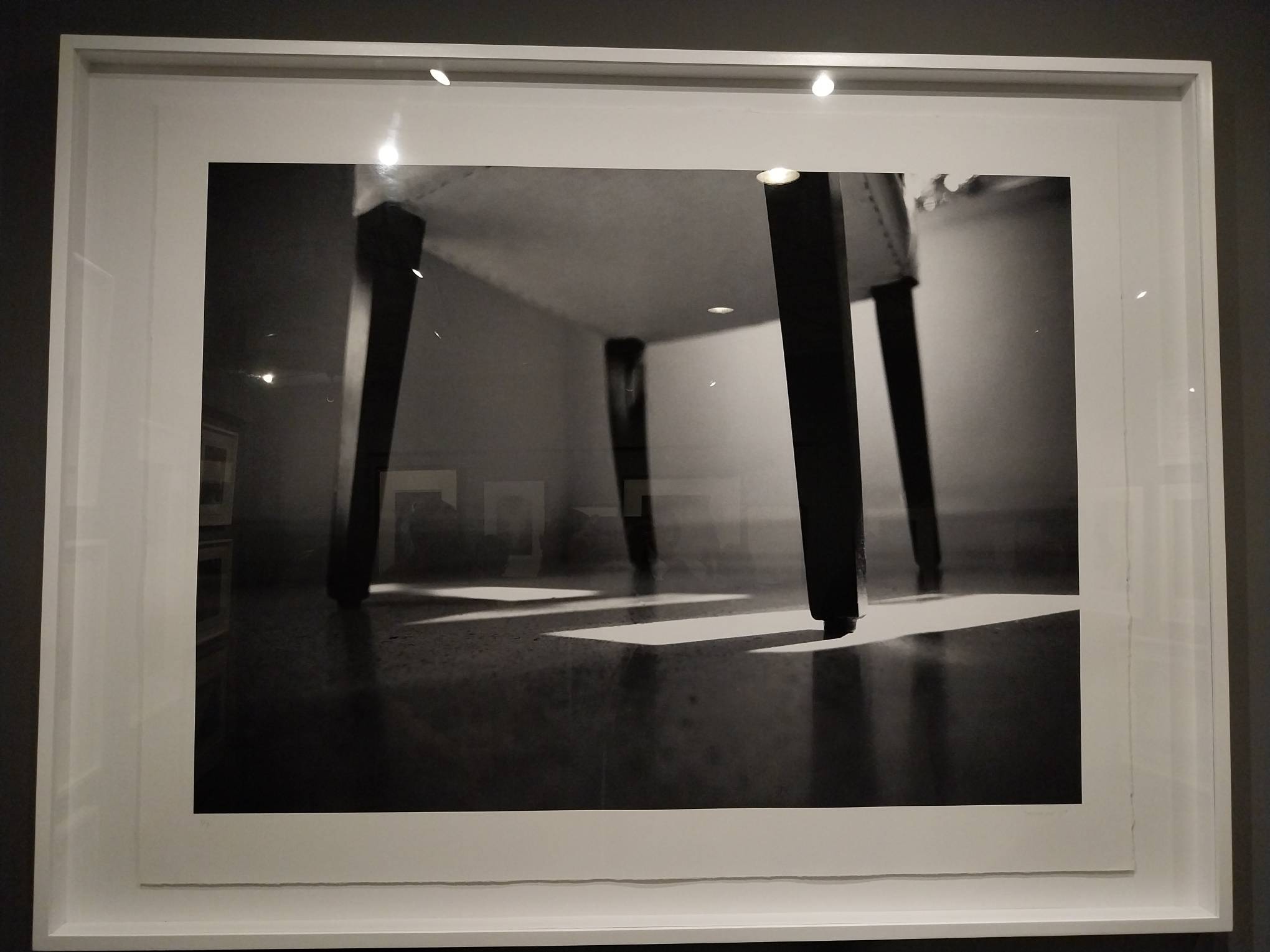 A picture of chair legs by Denise Weldon.