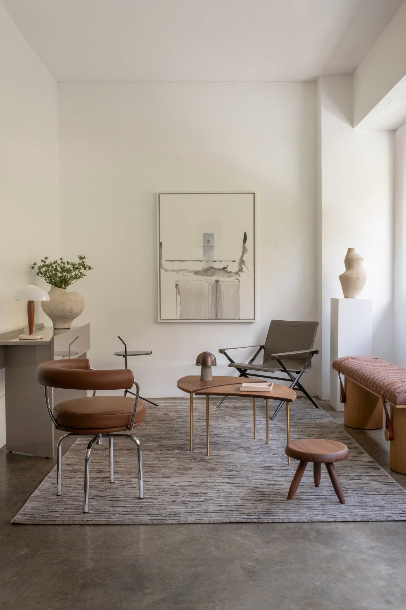 A vignette showing furniture in mocha mousse and other neutrals.