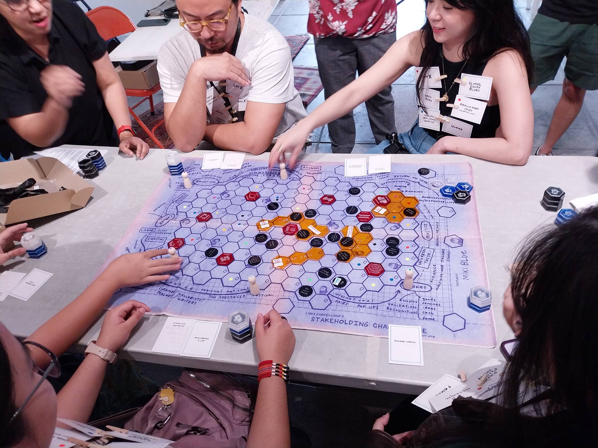 Players as they participate in the board game.