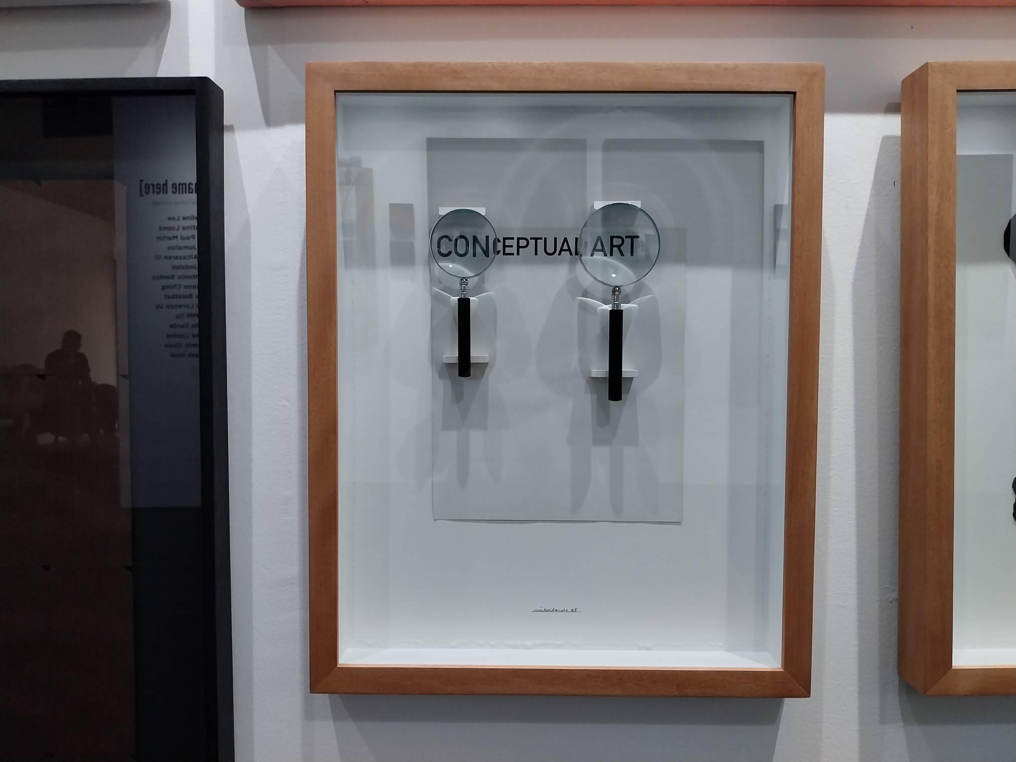 An artwork showing the words "conceptual art" from Modeka Art. Photo by Elle Yap.