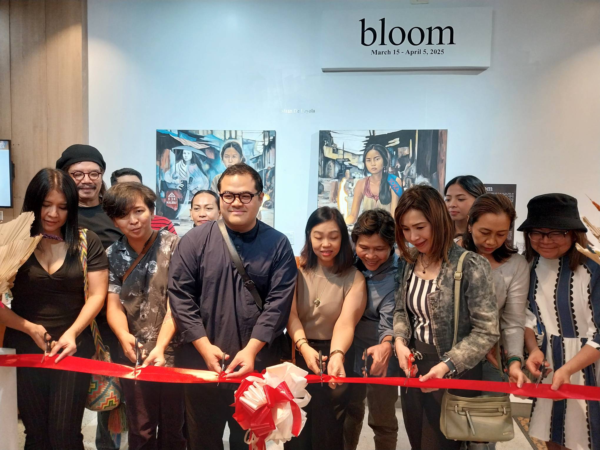 Some of the artists during the opening of "Bloom" at Kapitolyo Art Space.