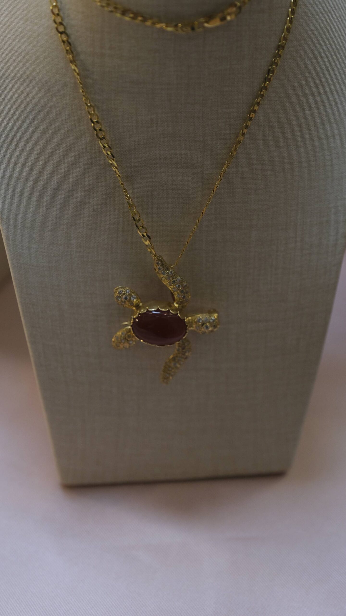 A turtle pendant.