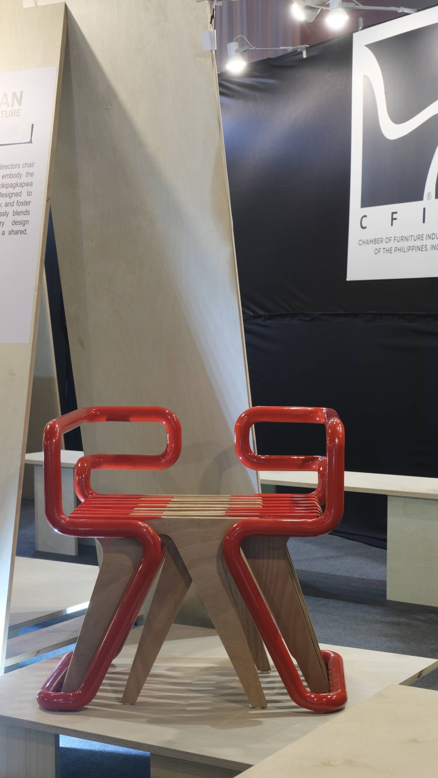 Red chair as shown in an exhibit at Interior + Design Manila 2025 by the PIID.