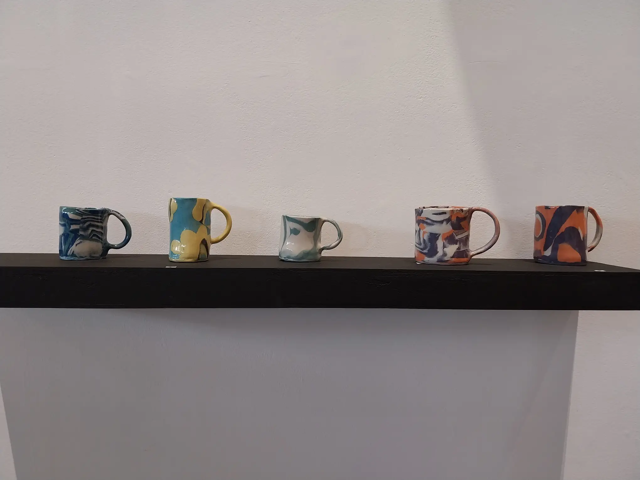 Five cups made by Winnie Go for "Nerikomi."