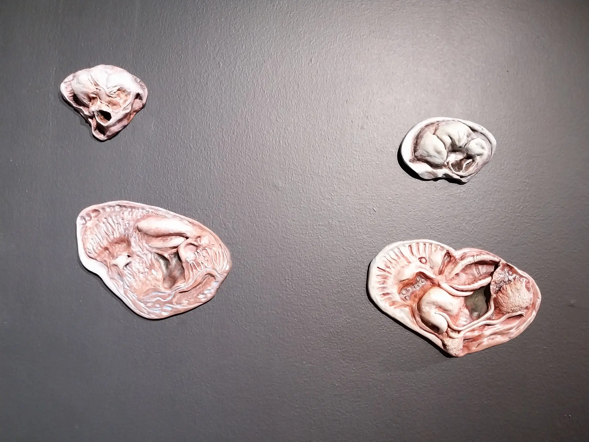 Four works by Sam Feleo.