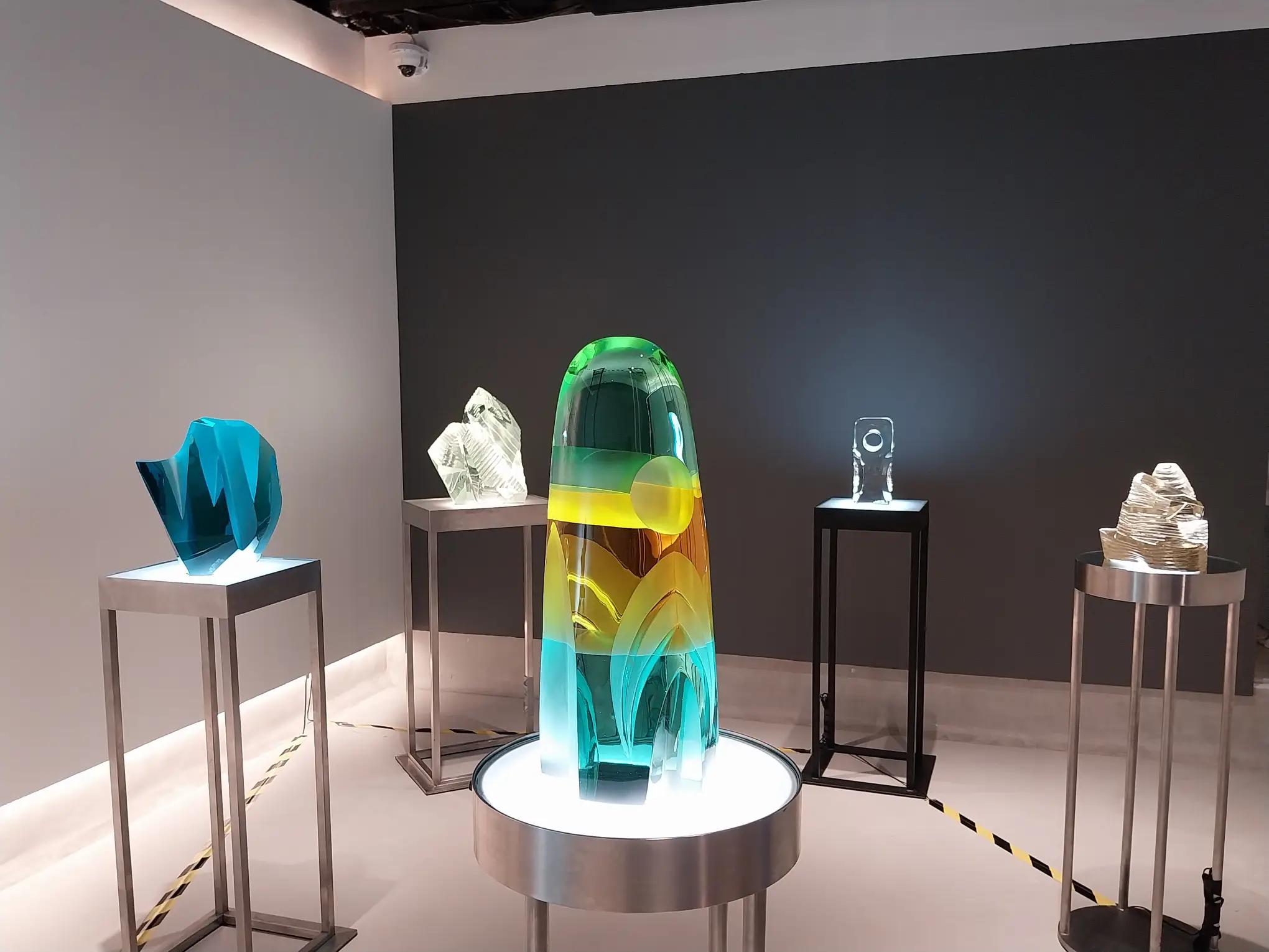 Five glass sculptures by Michael Orlina for "Shifting Reality" at Galerie Stephanie.