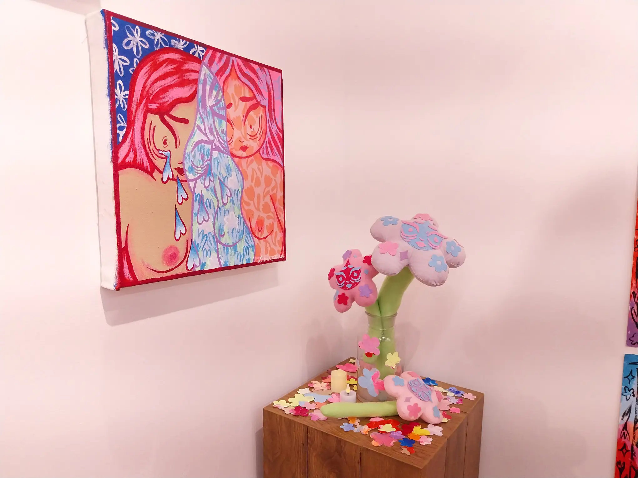 A painting and a fabric work by Laki Mata for her "Flower Eaters" exhibit.