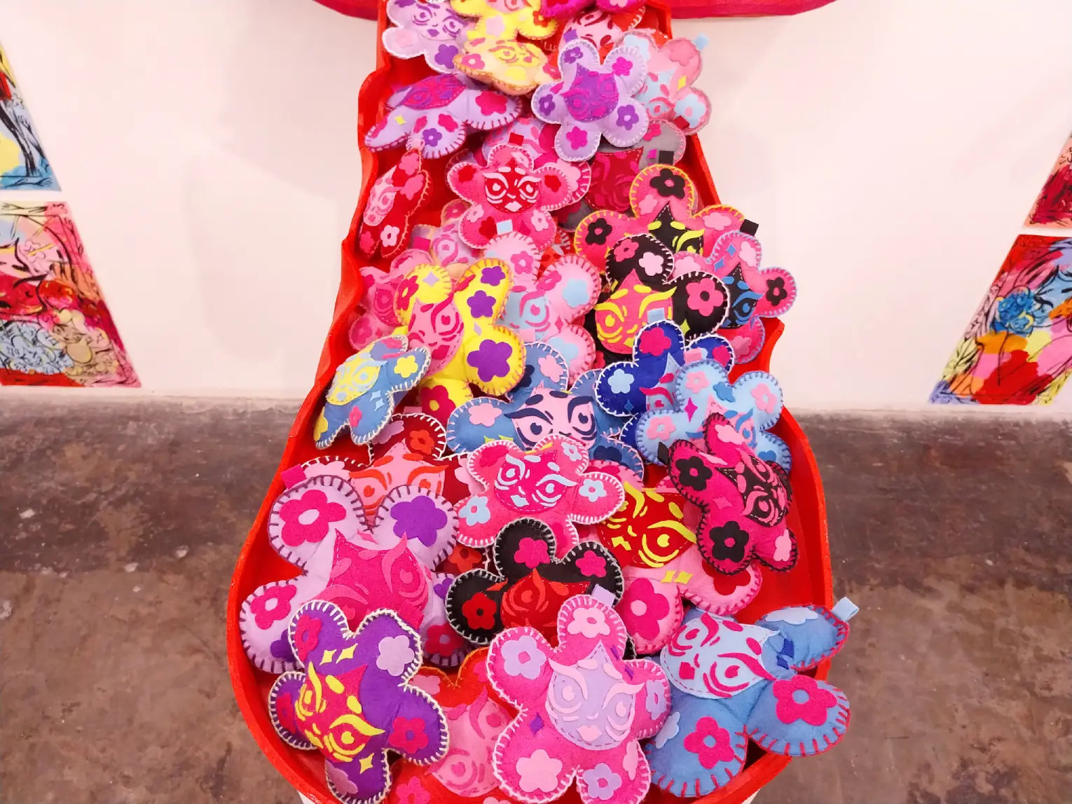 The individual flower plushies that Laki Mata made for the exhibit.