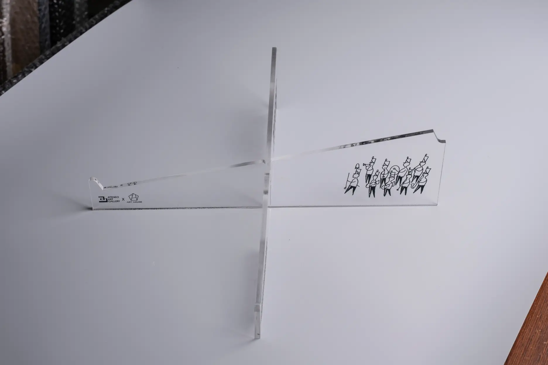 The laptop stand with Fernando Zóbel's "Batac Funeral" sketch.