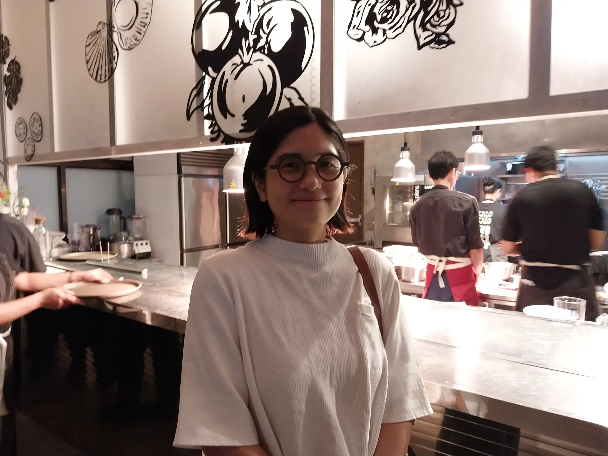 Artist Isabel Reyes Santos during her exhibit-slash-degustation with Now Now Canteen.