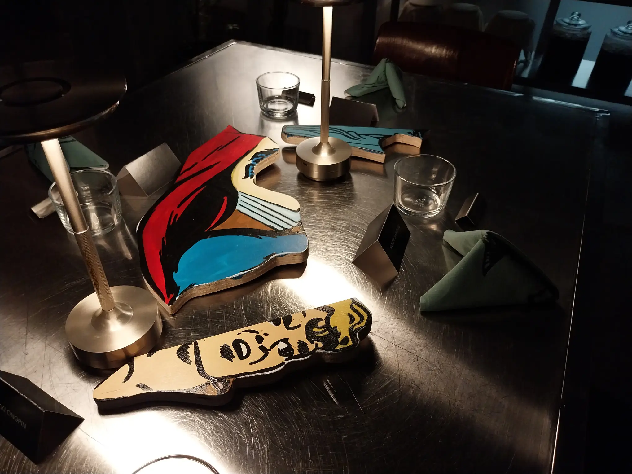 The tables at Now Now Canteen were decorated with some of Isabel Reyes Santos's art.