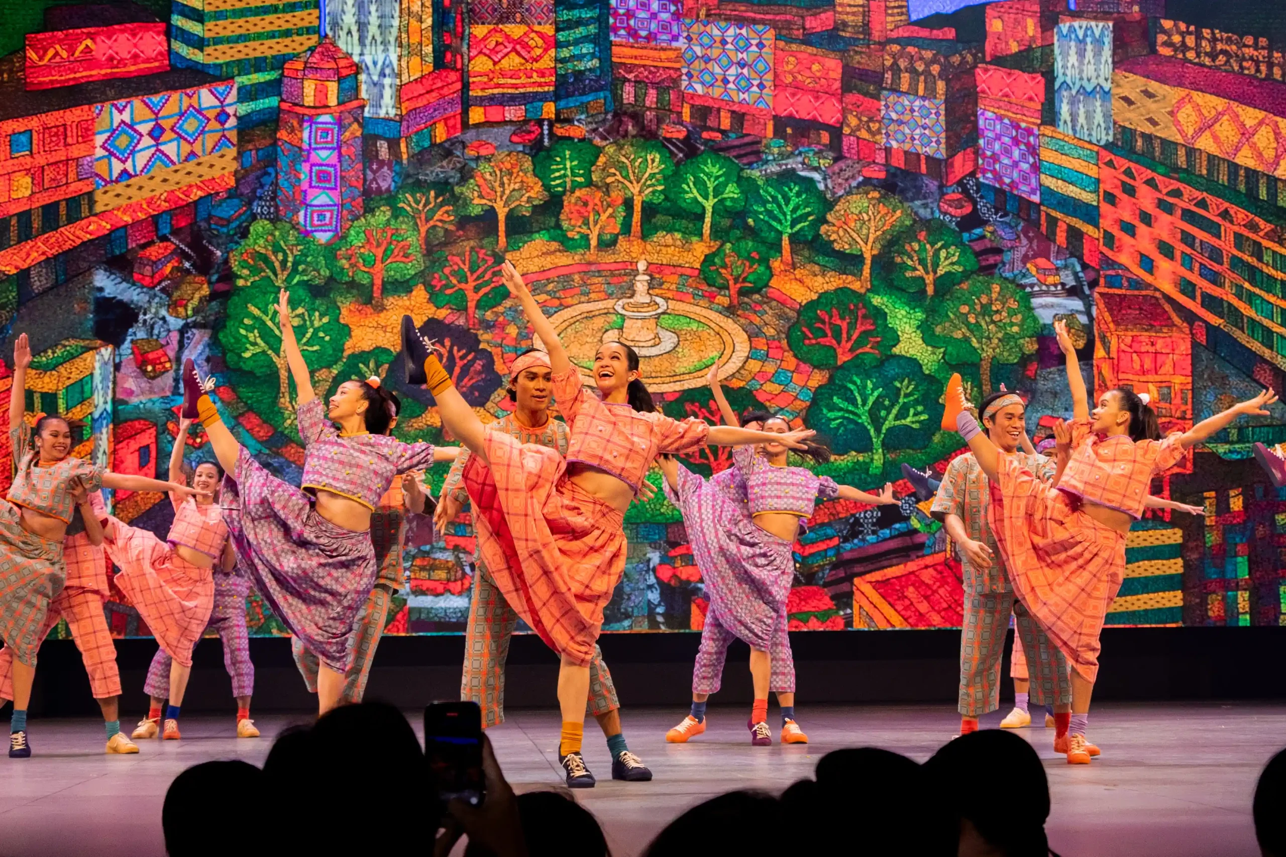 Alice Reyes Dance Philippines likewise wore combination textiles in oranges, purples, and greens.