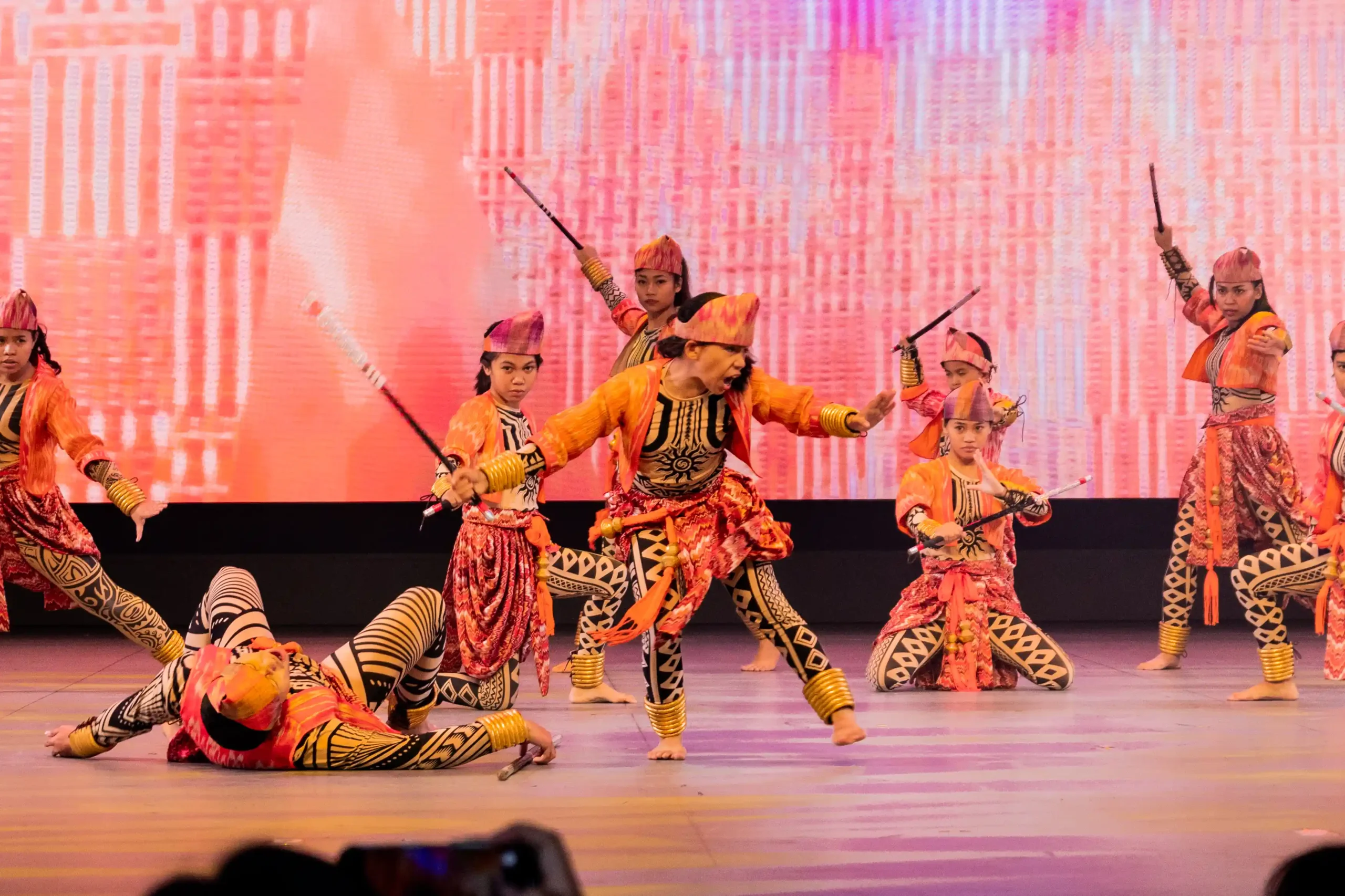 Lapu-Lapu Arnis de Abaniko performed in costumes inspired by pre-colonial Visayan warriors.