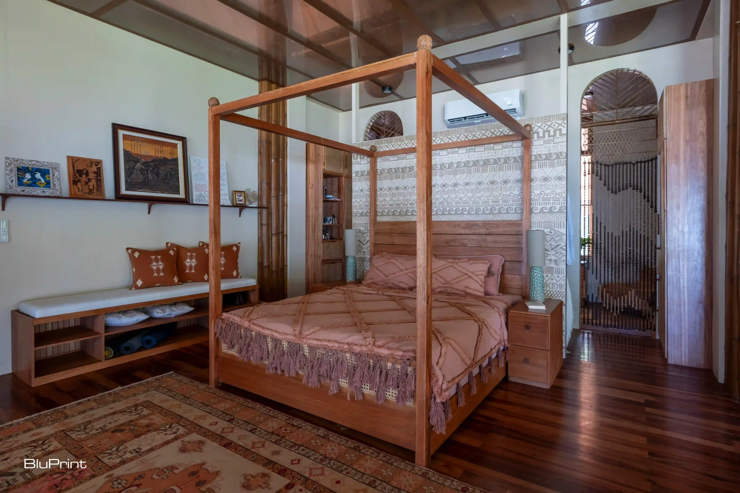 A four-poster bed in the master bedroom at Aman Sinaya.