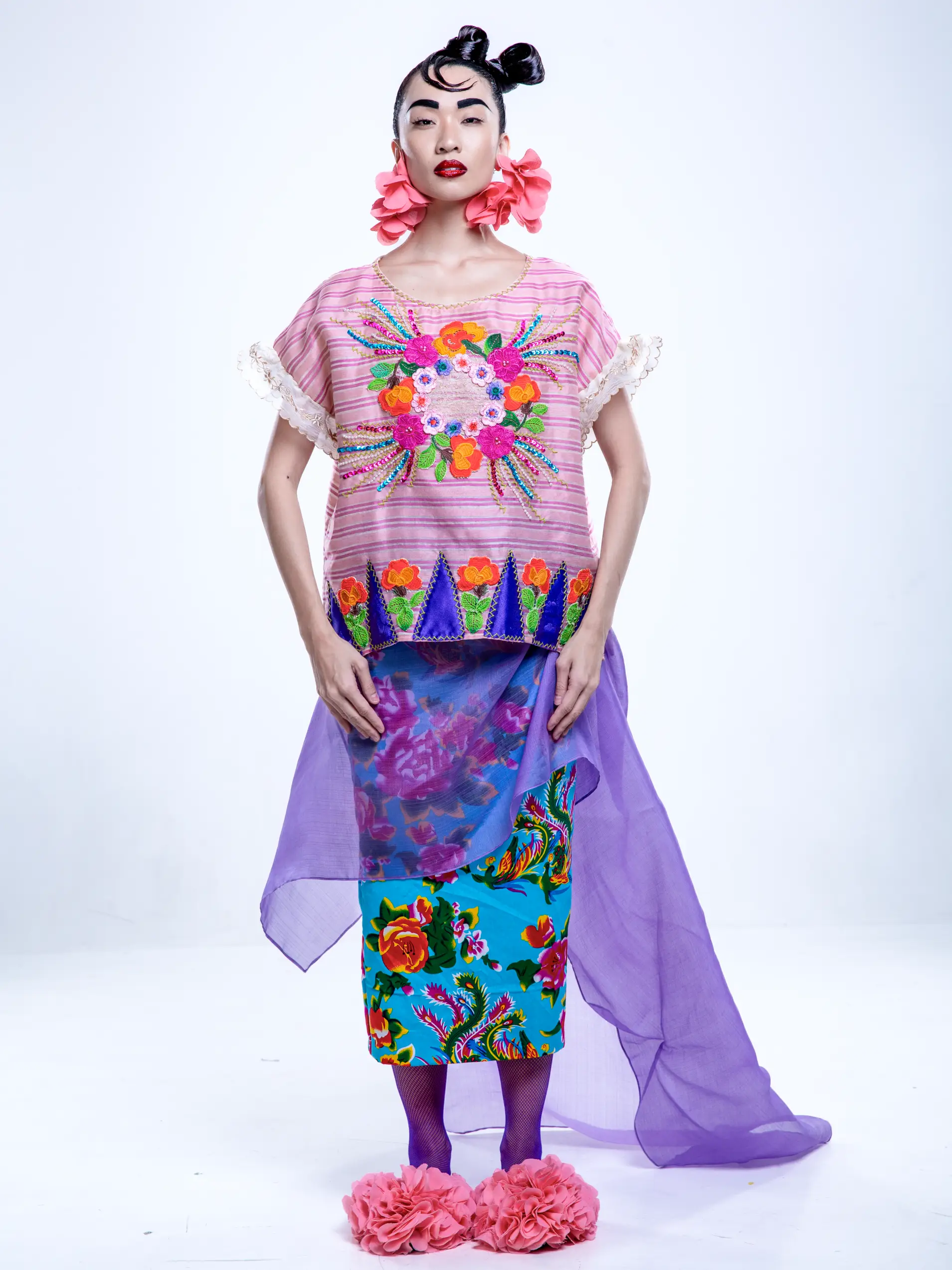 A model showing off the new collection by Jor-el Espina inspired by Patis Tesoro.