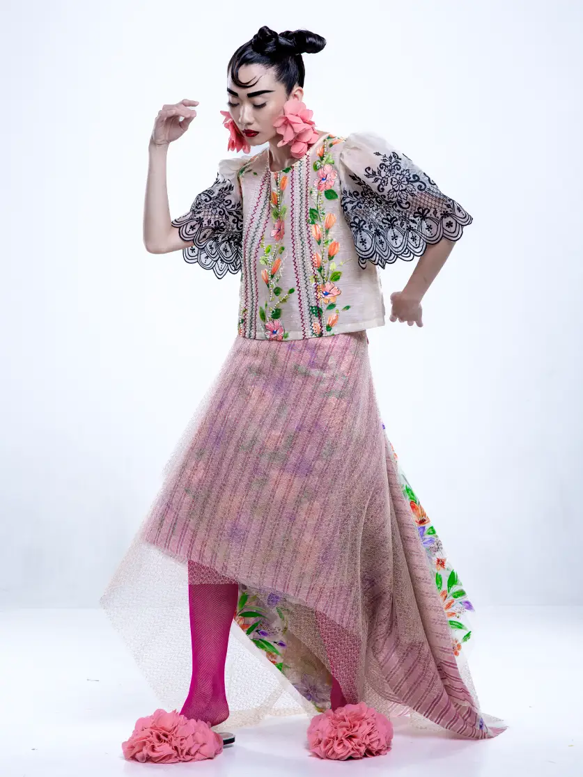 A model showing off the new collection by Jor-el Espina inspired by Patis Tesoro.