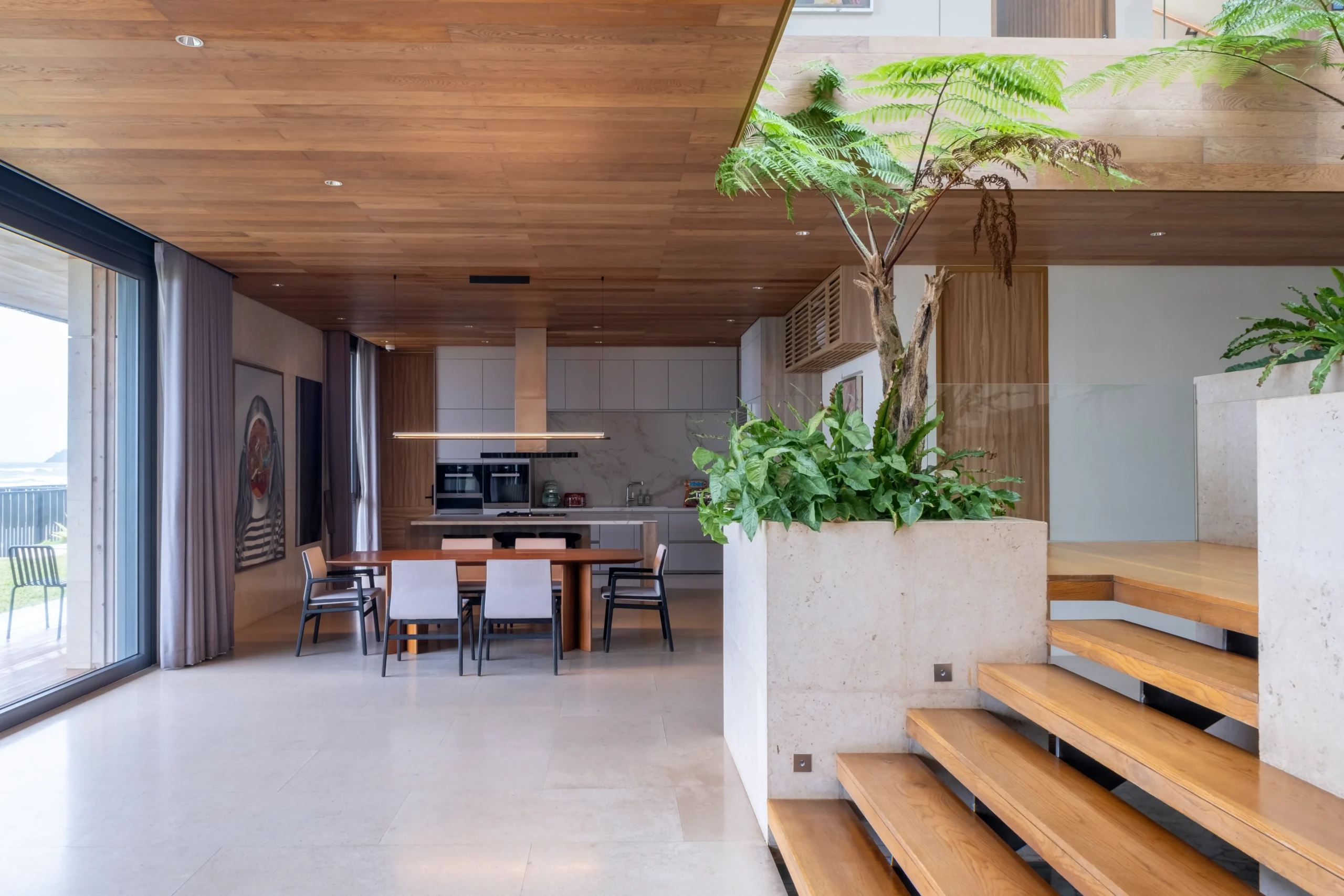 The dining area and staircase leading towards the second floor.