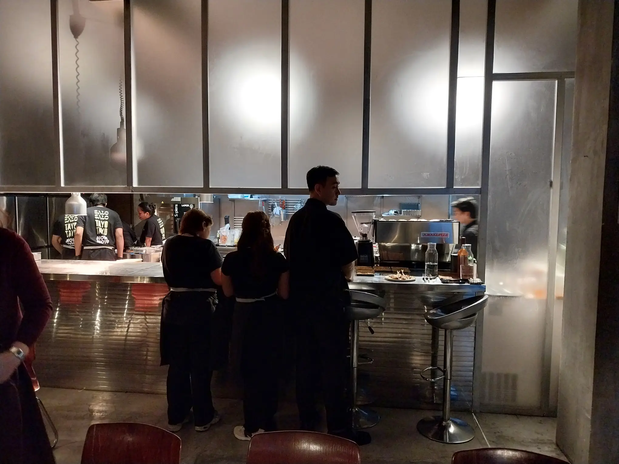 The staff of Now Now Canteen at work during the opening night of 'reNOWn.'