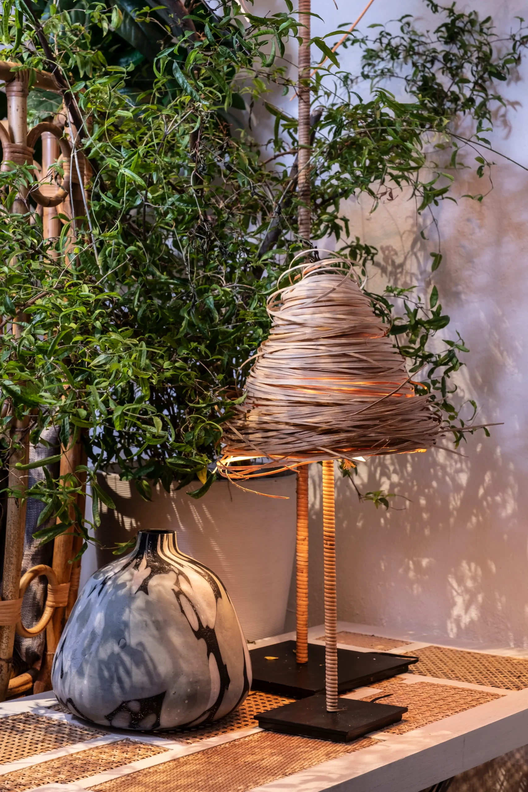Woven rattan lamp and ceramic vase in Ito Kish’s Makati showroom.