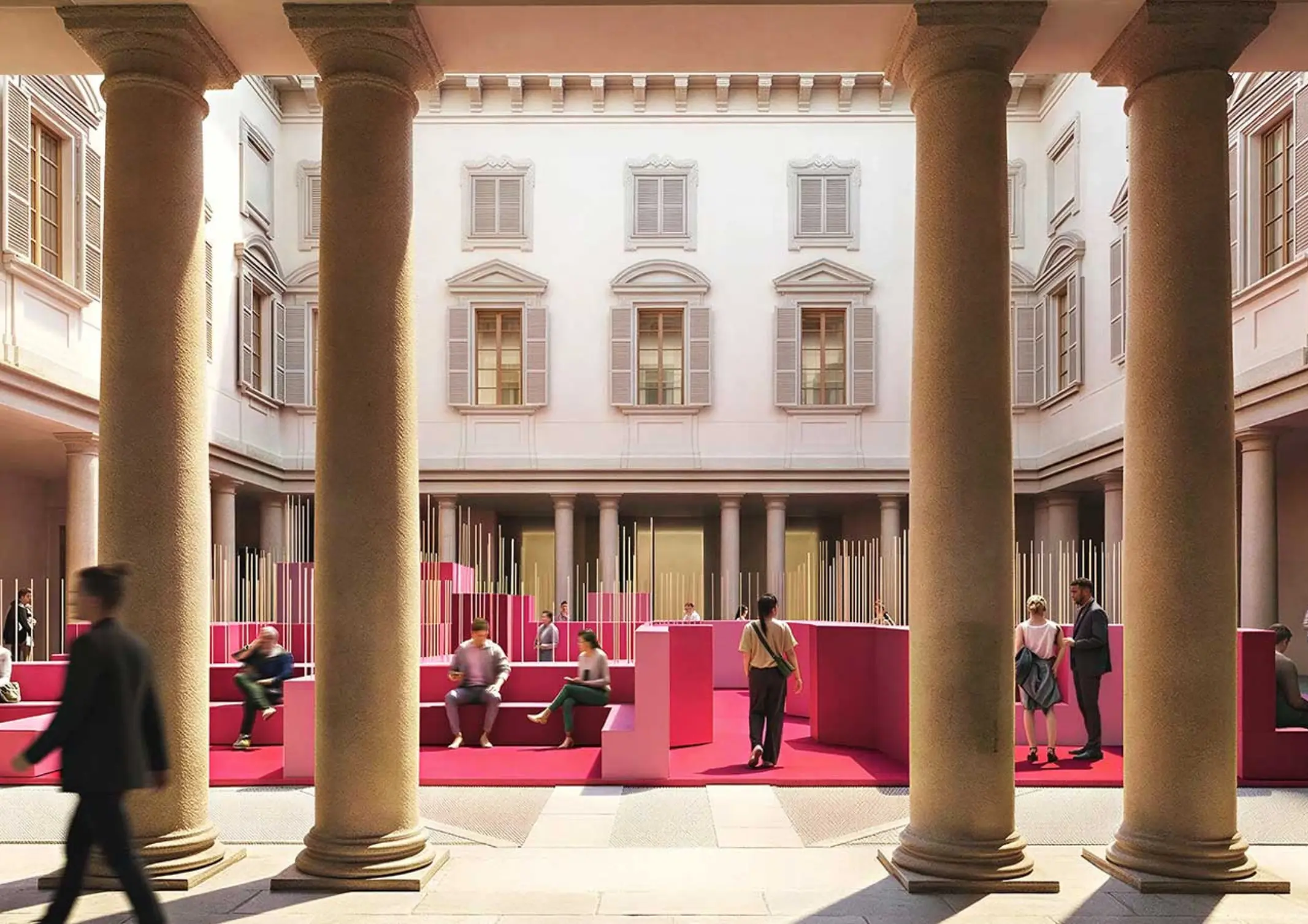 Interior courtyard with large stone columns and pastel pink stepped seating installation; people walking and standing nearby, classical windows above.